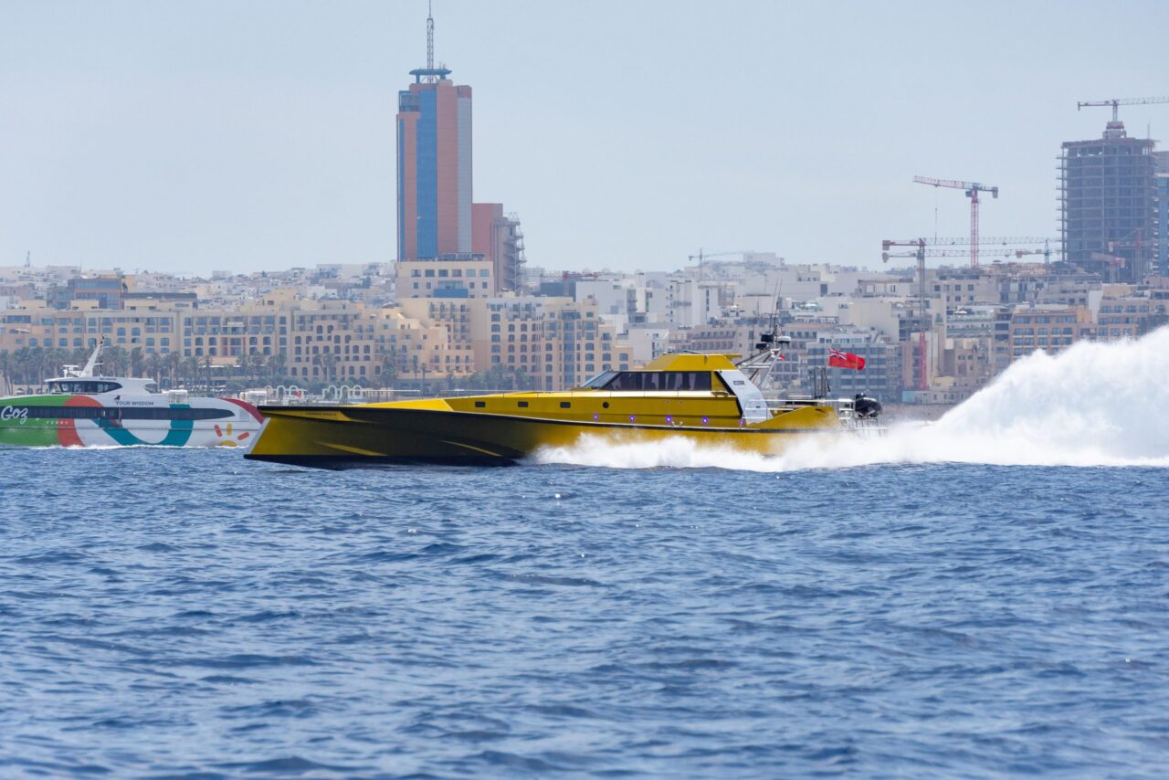 The yellow powerboat Thunder Child II at speed off Malta