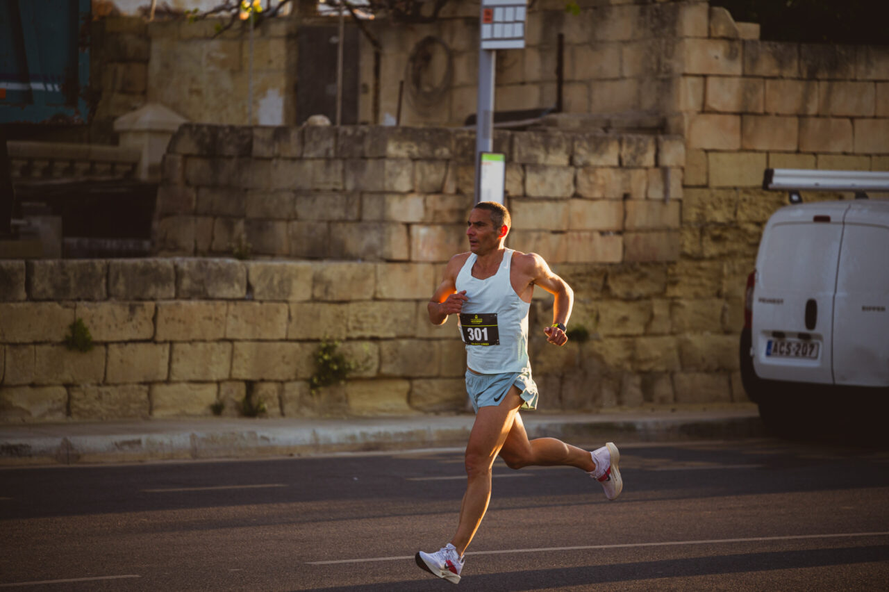 A runner on the Maqluba course in Qrendi